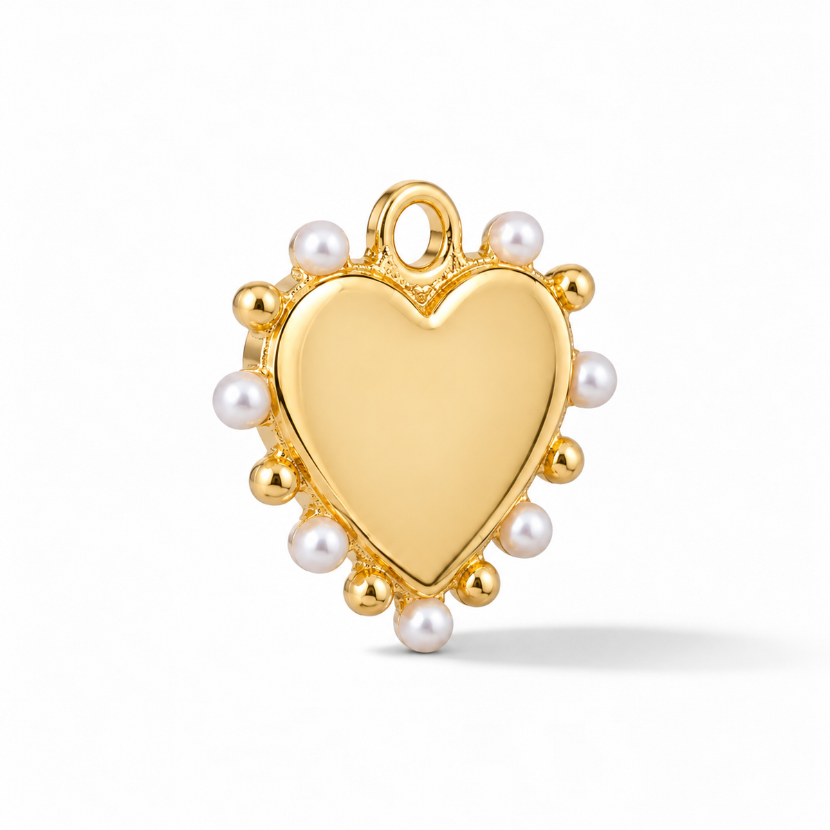 Amore Charm – Gold shown at a three-quarter angle on white.