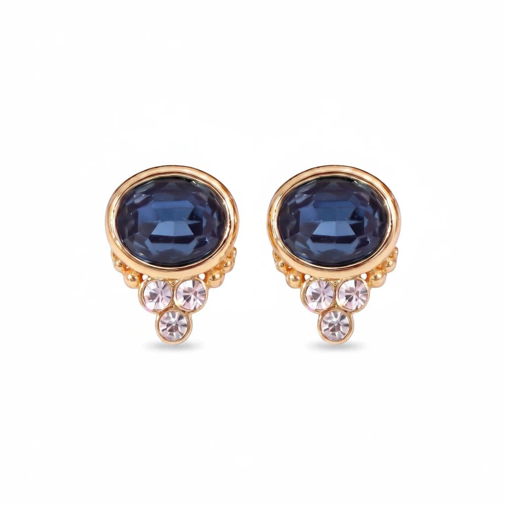 Gresham BonBon sapphire oval stud earrings with gold setting and small accent crystals.