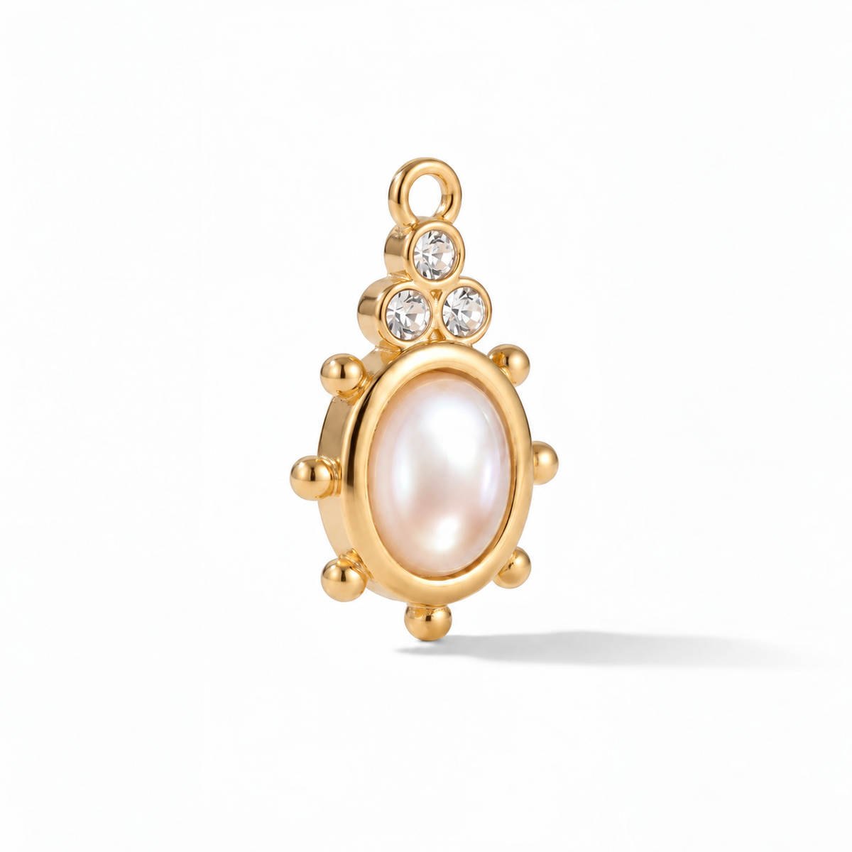 Cupola Pearl Charm in gold, shown at a three-quarter angle on white.