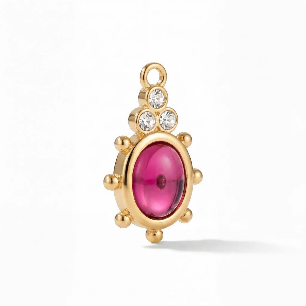 Gresham Cupola Charm in 18k gold plate featuring a pink tourmaline cabochon stone and detachable bail.
