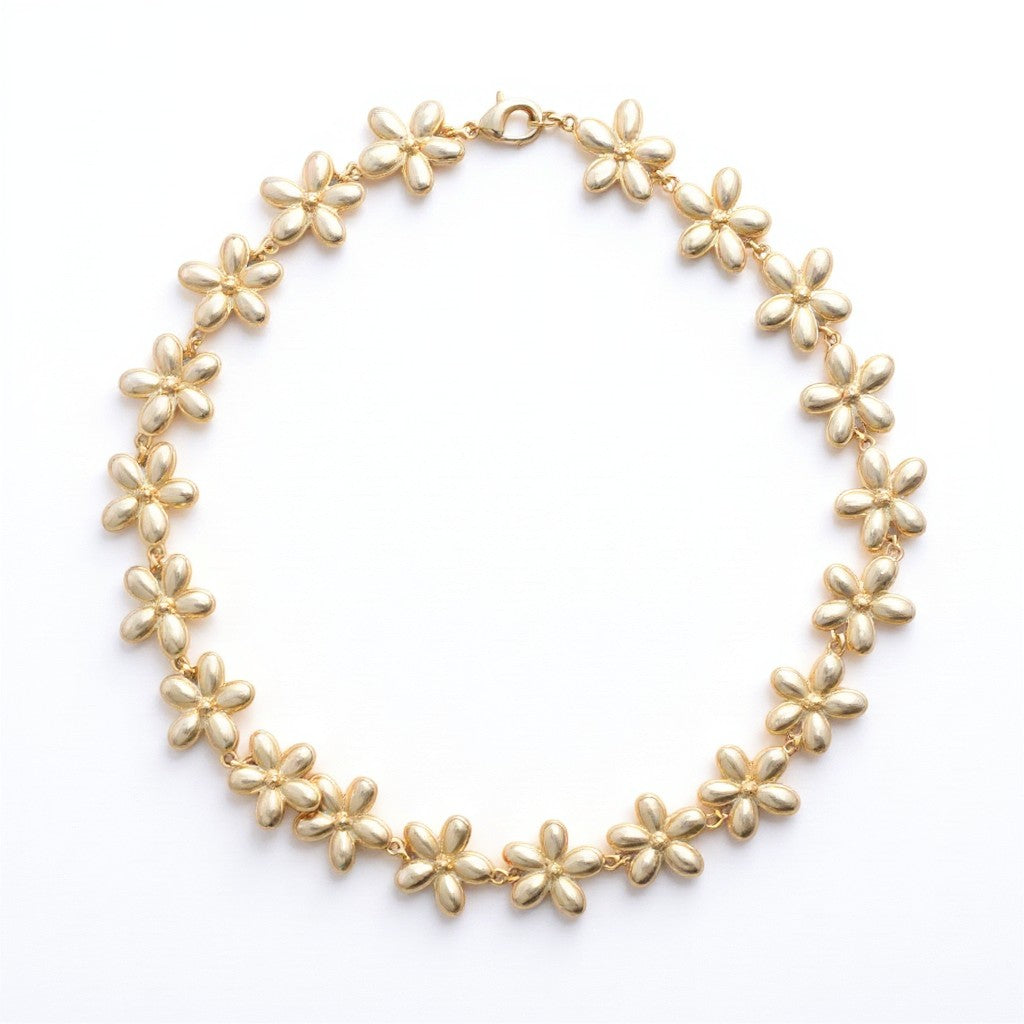 Gresham Flora necklace featuring a chain of gold-toned metal flower charms in a delicate spring-inspired design.