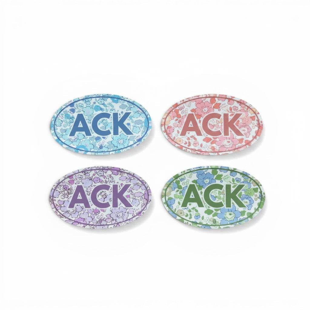 Gresham set of four oval ACK stickers featuring colorful floral patterns in blue, pink, purple, and green.