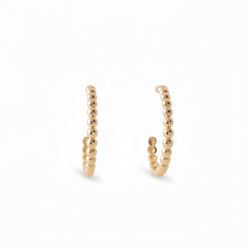 Gresham Florentina medium gold hoop earrings featuring a delicate beaded texture design on a white background.