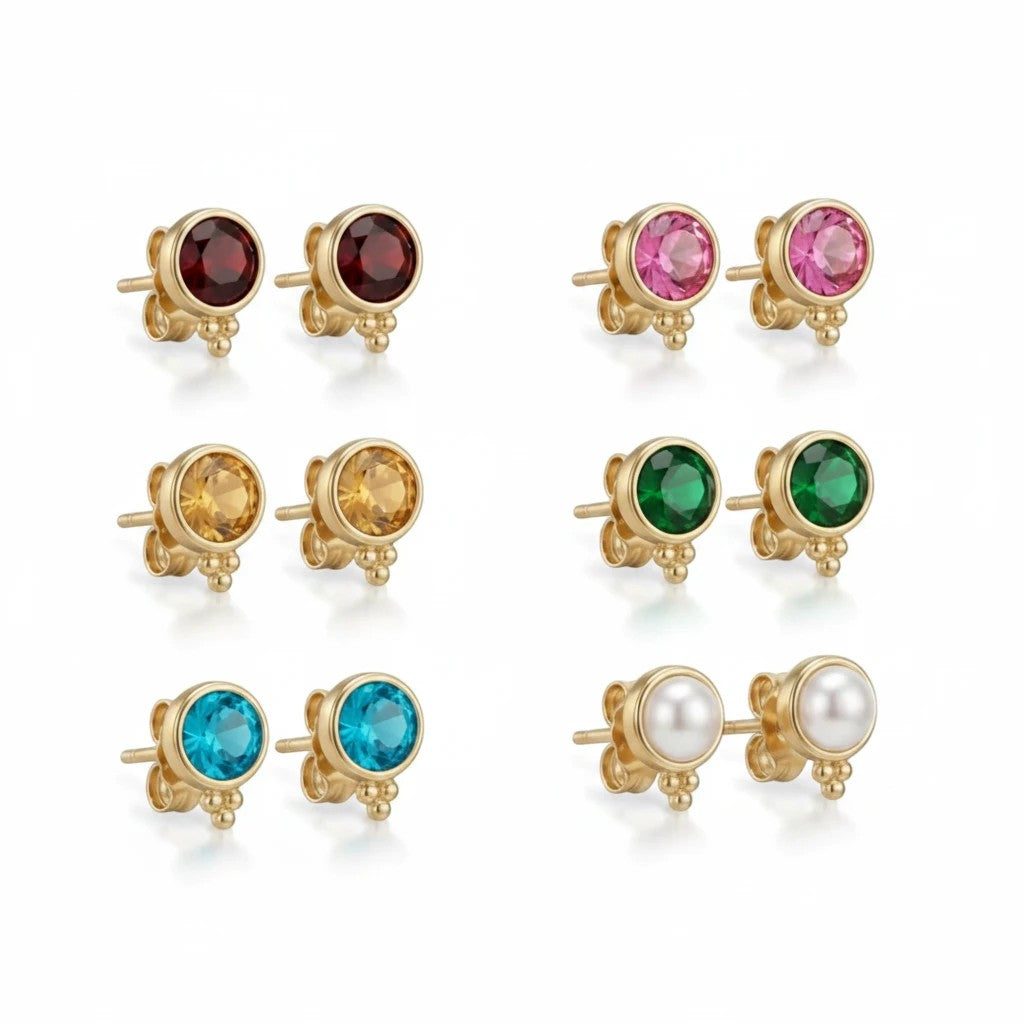 Gresham Fortuna Stud Set featuring six pairs of gold-tone earrings with colorful gemstones and a pearl stud.