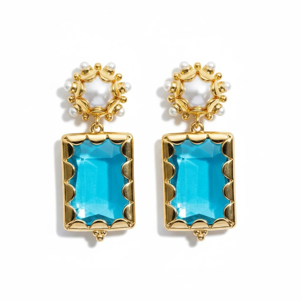 Gresham Mini Gemma earrings featuring rectangular azure blue stones, pearl accents, and gold-tone scalloped settings.