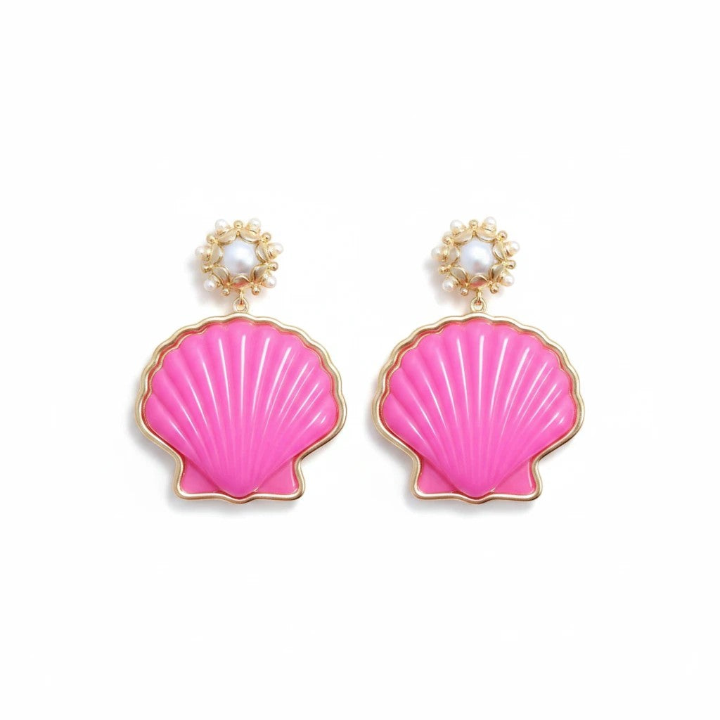 Gresham Peregrina scallop shell earrings in bright pink with gold trim and pearl accents on a white background.