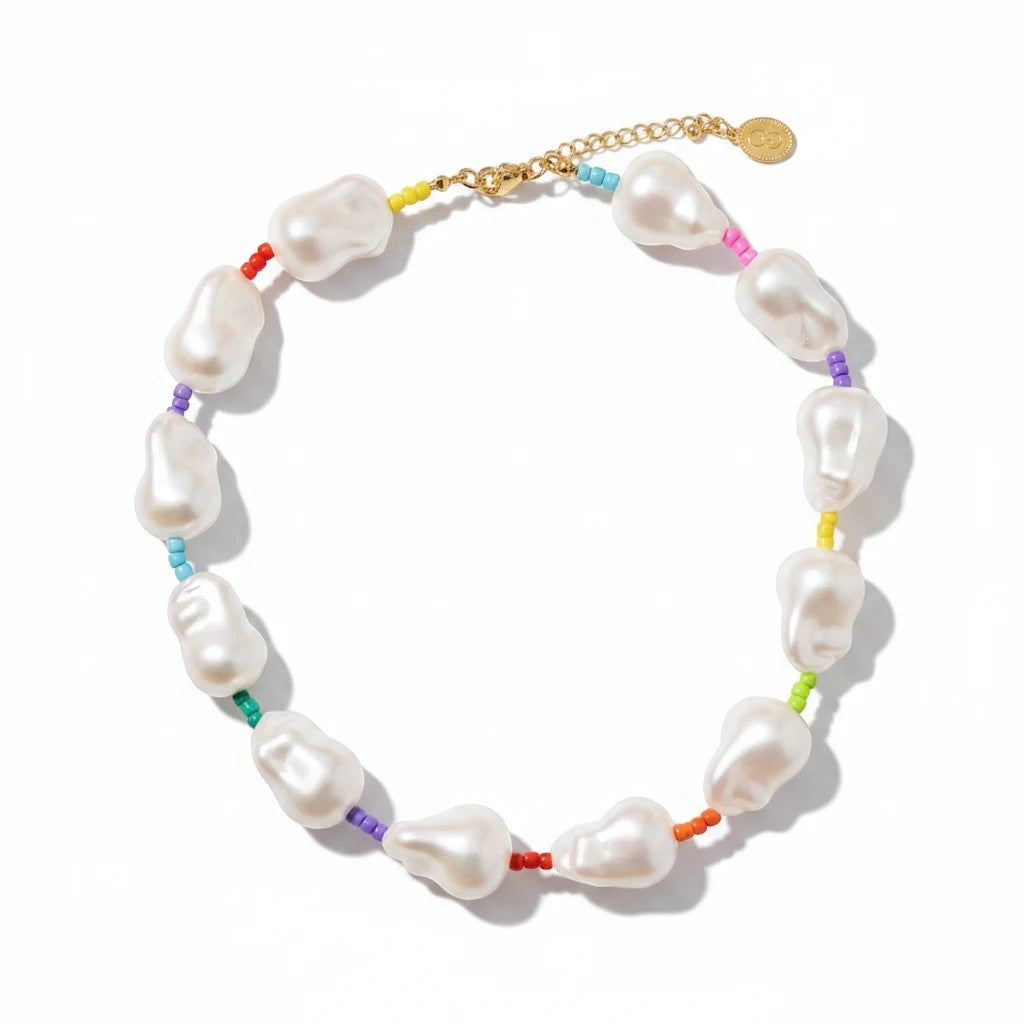 Gresham Rocco Rainbow necklace featuring large white baroque glass pearls alternating with colorful rainbow seed beads.