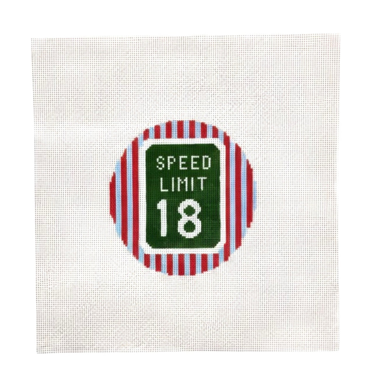 Needlepoint design with an 18 speed limit sign and striped circle